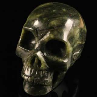 S1782 Carved xiu jade skull figurine  
