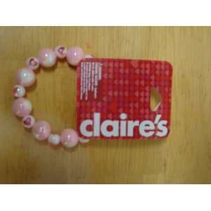  CLAIRES PINK BALL BRACELET WITH WHITE HEARTS: Everything 