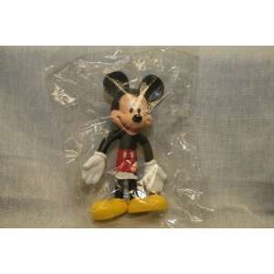    Mickey Mouse 4 inches from Walt Disney World 