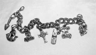 Born To Shop Cat Cross Silver 7 Charm Silver Bracelet  