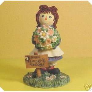    Enesco Raggedy Ann Andy Ann With Flowers 953016: Home & Kitchen