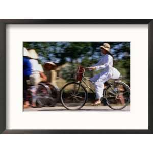  Girl Riding Bike, Ho Chi Minh, Vietnam Framed Photographic 