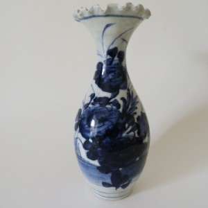 This is a 19th Century Japanese Arita blue & white porcelain vase with 