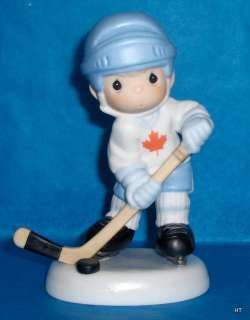 PRECIOUS MOMENTS~CAN.EXCL. HOCKEY PLAYER # 99 LTD.ED.  