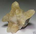 Double terminated CALCITE crystal on Fluorite items in Christensen 