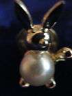 Easter Bunny Lapel Pin Gold tone with Faux Pearl Center measures 1/2 x 