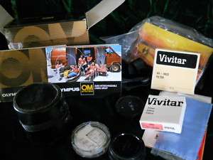 Vivitar Sima lens filter boxs instruction manuals etc  