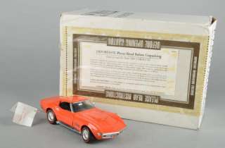   MINT Orange 1969 Chevy Corvette Stingray 124 Diecast Model Car w/ Box
