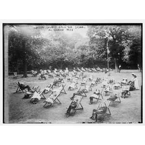 Children in chairs on lawn during afternoon rest,London County Open 