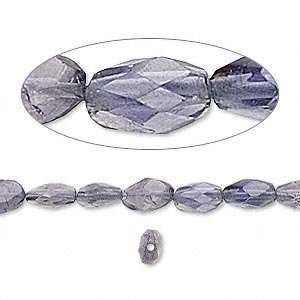  Bead iolite (dyed)6x4 9x6 mm faceted flat oval. Sold per 