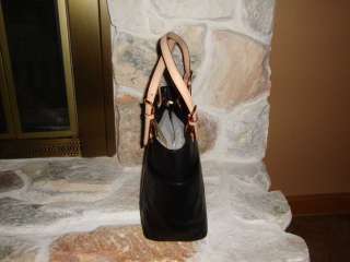   BLACK LEATHER BAG WITH DETAILED STITCHING AND POLISHED BRASS HARDWARE