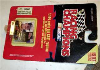   Cast NASCAR replica stock car with collector’s card & display stand