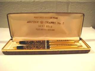 CHANEL No 5 AND ARPEGE 14KT GOLD PERFUMED WRITING PENS  