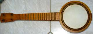  ukulele banjo is really neat needs some tlc has a missing tuning 