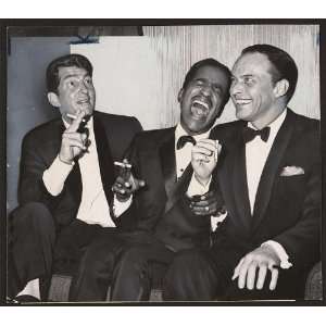   trio,Dean Martin,Sammy Davis Jr,Frank Sinatra,cigarettes,sofa,1961