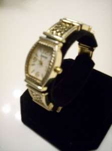   Chicos Goldtone Bamboo style Watch with Gold Expansion Band  
