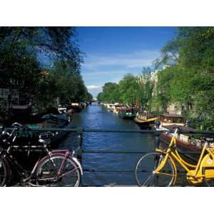  Yellow Bicycle and Canal, Amsterdam, Netherlands Premium 